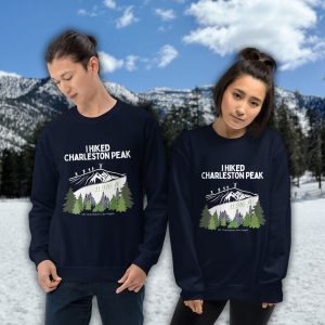 charleston peak hiking sweatshirt unisex hiker standing on summit waving poles 11916 ft mt charleston nevada mountain hike design